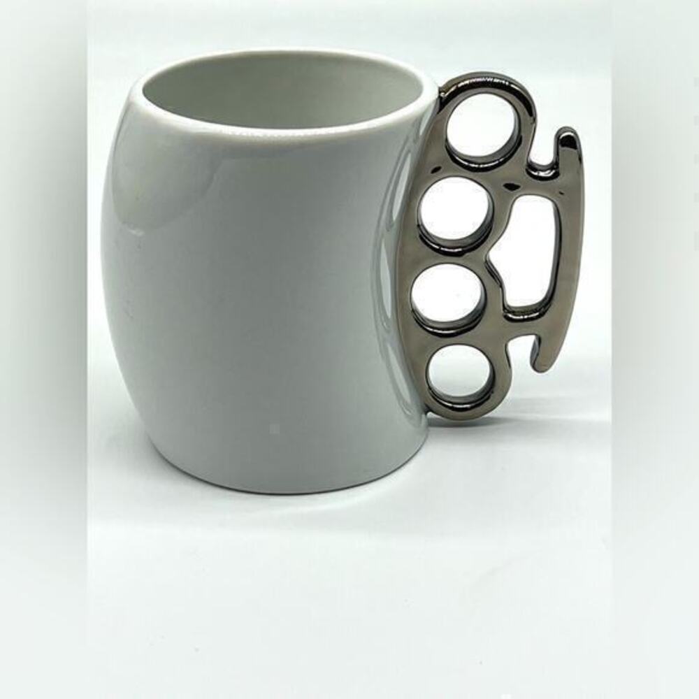 Brass knuckles coffee mug white and silver